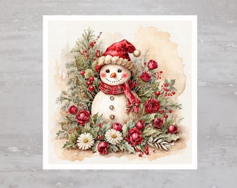 May include: A snowman wearing a red Santa hat and scarf is surrounded by red roses and green foliage. The background is a watercolor wash of beige and brown.