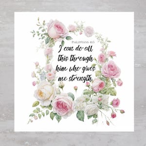 May include: A white background with a floral wreath of pink and white roses. The text "Philippians 4:13 I can do all this through him who gives me strength." is in the centre of the wreath.