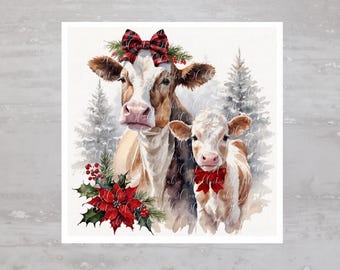 May include: A watercolor painting of a brown and white cow with a red and black plaid bow and a smaller brown and white calf with a red bow. Both cows are standing in a snowy forest with pine trees and red poinsettias.