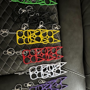 Metal Cat ear bottle opener keychain comes in variety of colors