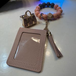 Beaded wristlet wallets