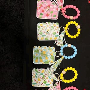 Beaded wristlet wallets