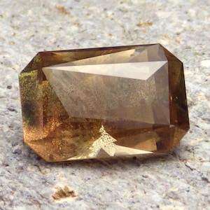 Green Schiller Oregon Sunstone 12.36 Ct Clarity SI2, Octagon Cut 16.9 x 11.4 mm, See Video!!