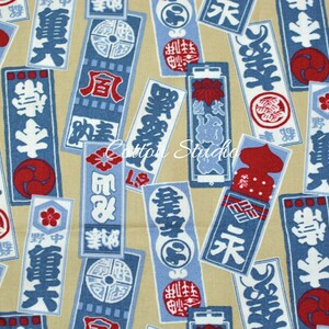 May include: A beige fabric with a repeating pattern of blue and red Japanese characters and symbols. The characters are in a rectangular shape and have a white outline. The symbols are circular and have a white outline.