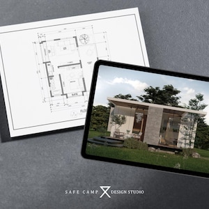 May include: A digital tablet displays a modern house design, with a white roof and glass walls, set in a green landscape. A blueprint of the house plan is next to the tablet. The image is on a gray surface. The text "SAFE CAMP DESIGN STUDIO" is at the bottom.