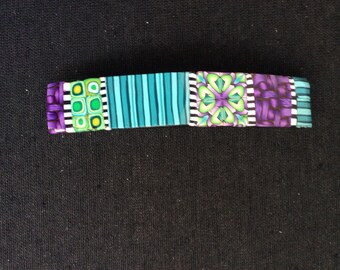 Barrette de arcilla polimérica o clip de bufanda