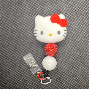 Pretty Kitty with red bow
