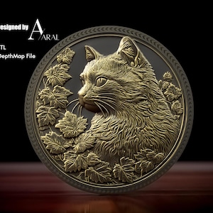 Puede incluir: Escultura circular en relieve con el perfil de un gato rodeado de hojas. El diseño presenta tonos dorados y bronce, con el texto "Designed by ARAL" y "STL DepthMap File" en la esquina superior izquierda.