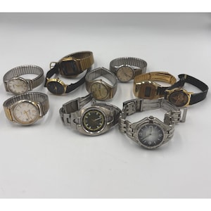 May include: A set of three ceramic mugs with a speckled, matte finish. The mugs are in shades of cream, light gray, and dark gray. Each mug has a simple, minimalist design, perfect for coffee or tea.