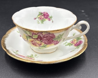 Porcelain Tea Cup and Saucer 20th Century Hand Painted Gold Trim Pink Rose