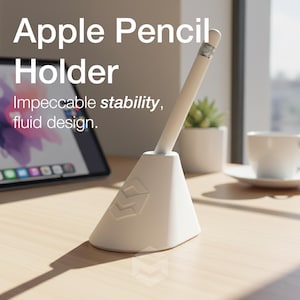 May include: A white Apple Pencil holder with a modern design, holding a white and silver Apple Pencil. The holder has a geometric shape and the text "Apple Pencil Holder" and "Impeccable stability, fluid design."