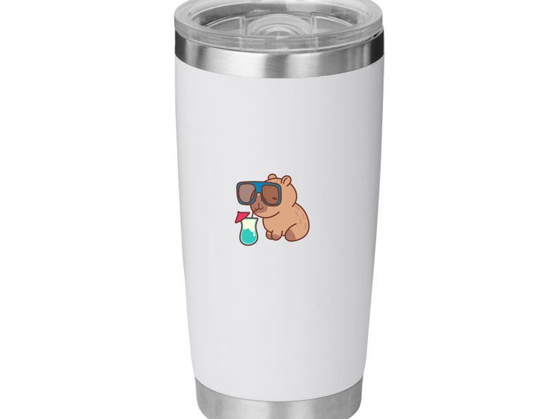 May include: White stainless steel tumbler with a cartoon illustration of a brown bear wearing sunglasses and holding a cocktail. The tumbler has a silver rim and lid, perfect for cold beverages.