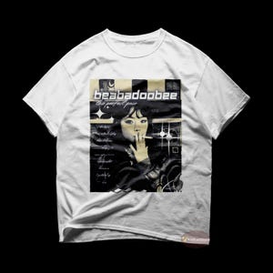 May include: White t-shirt featuring a black and white graphic print of a woman with the text "beabadoobee the perfect pair" on it.