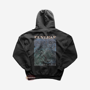 May include: A dark gray hooded sweatshirt with a graphic print of a blue and green design. The design features the text "FLYLEAF" and "NEW HORIZONS".