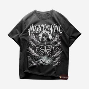 May include: Black t-shirt with a white graphic of a skeleton wearing a hooded cloak. The graphic includes the text "Pierce the Veil" and "Collide with the Sky".