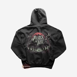 May include: Black hooded sweatshirt with a graphic print of a red moon, trees, and the text "Pierce The Veil" in white.