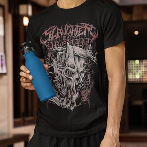 May include: A black t-shirt with a graphic print of a skull and the text "SLAUGHTER TO PREVAL." The person is holding a blue water bottle.
