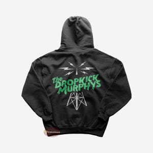 May include: Black hooded sweatshirt with a green and white graphic of a radio tower and the text "The Dropkick Murphys".
