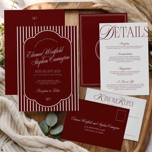 May include: Burgundy wedding invitation suite with white text. The main invitation features vertical stripes and the names Eleanor Westfield and Stephen Carrington. Includes details, RSVP, and address cards.