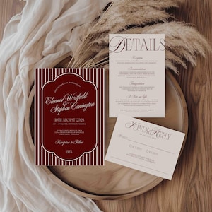 May include: A wedding invitation suite featuring a burgundy and white striped invitation card with the names "Eleanor Westfield & Stephen Carrington" and event details. Includes a details card and a reply card, all with elegant typography.