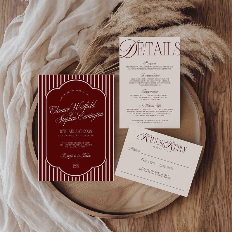 May include: A wedding invitation suite featuring a burgundy and white striped invitation card with the names "Eleanor Westfield & Stephen Carrington" and event details. Includes a details card and a reply card, all with elegant typography.