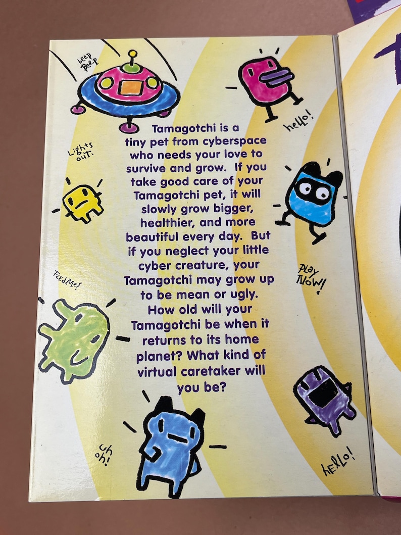 May include: A yellow background with colorful cartoon characters and text that reads "Tamagotchi is a tiny pet from cyberspace who needs your love to survive and grow. If you take good care of your Tamagotchi pet, it will slowly grow bigger, healthier, and more beautiful every day. But if you neglect your little cyber creature, your Tamagotchi may grow up to be mean or ugly. How old will your Tamagotchi be when it returns to its home planet? What kind of virtual caretaker will you be?"