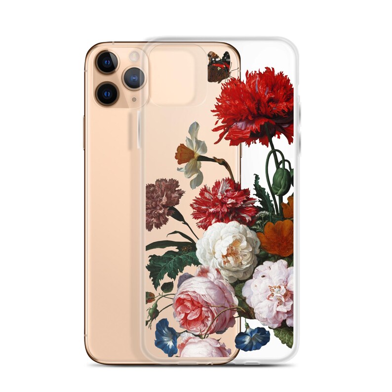 May include: A clear phone case featuring a floral design with red, white, pink, and orange flowers. The case is on a gold-colored phone. The floral arrangement includes a butterfly and various flower types.