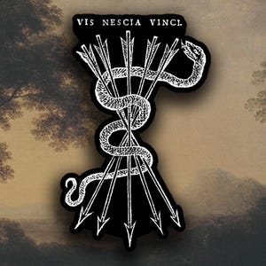 May include: Black and white sticker featuring a coiled snake pierced by arrows. The sticker has the Latin phrase "VIS NESCIA VINCI" at the top. The design is a detailed illustration with a vintage aesthetic.
