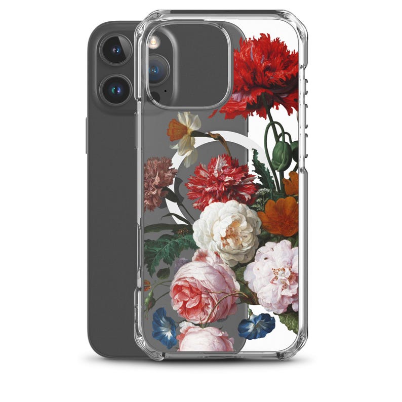 May include: Clear phone case featuring a floral design with red, pink, white, and blue flowers. The flowers are arranged in a classic, vintage style, with a gray background. The phone case is shown on a gray phone.