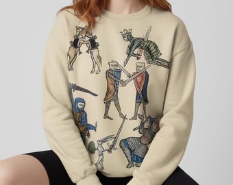 Sudadera unisex con cuello redondo y diseño de batalla medieval extraña. Sudadera con marginalia medieval.