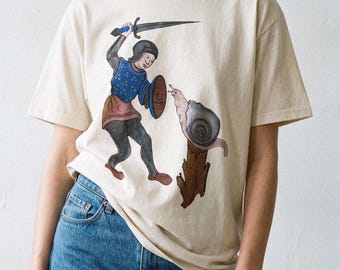Unisex Weird Medieval Knight fighting snail t-shirt, Medieval Art classic tee