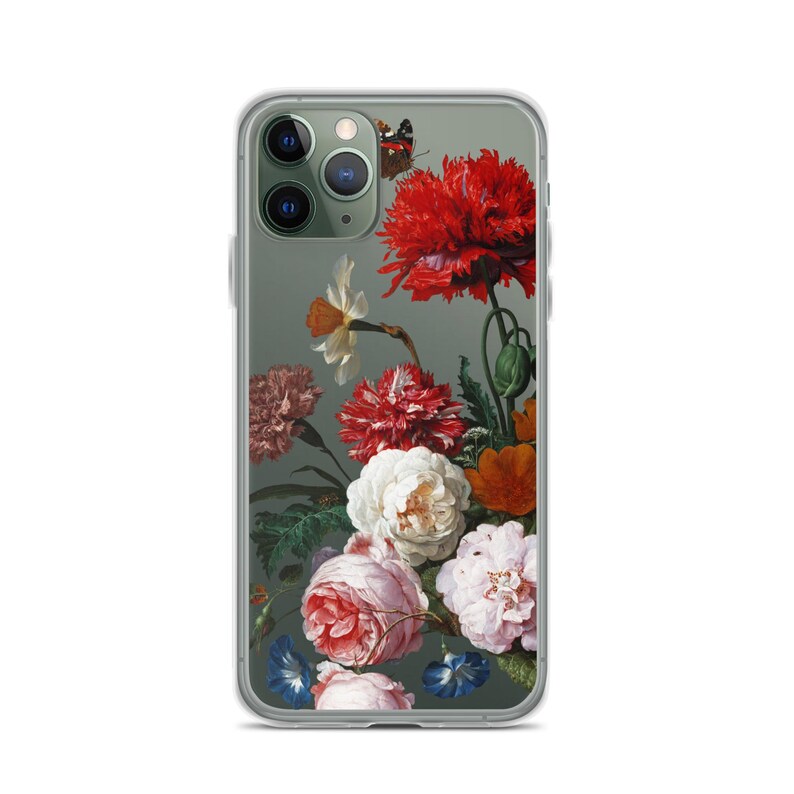 May include: Clear phone case featuring a floral still life design with red, white, pink, and orange flowers, and a butterfly. The case has a clear border and a dark green background.