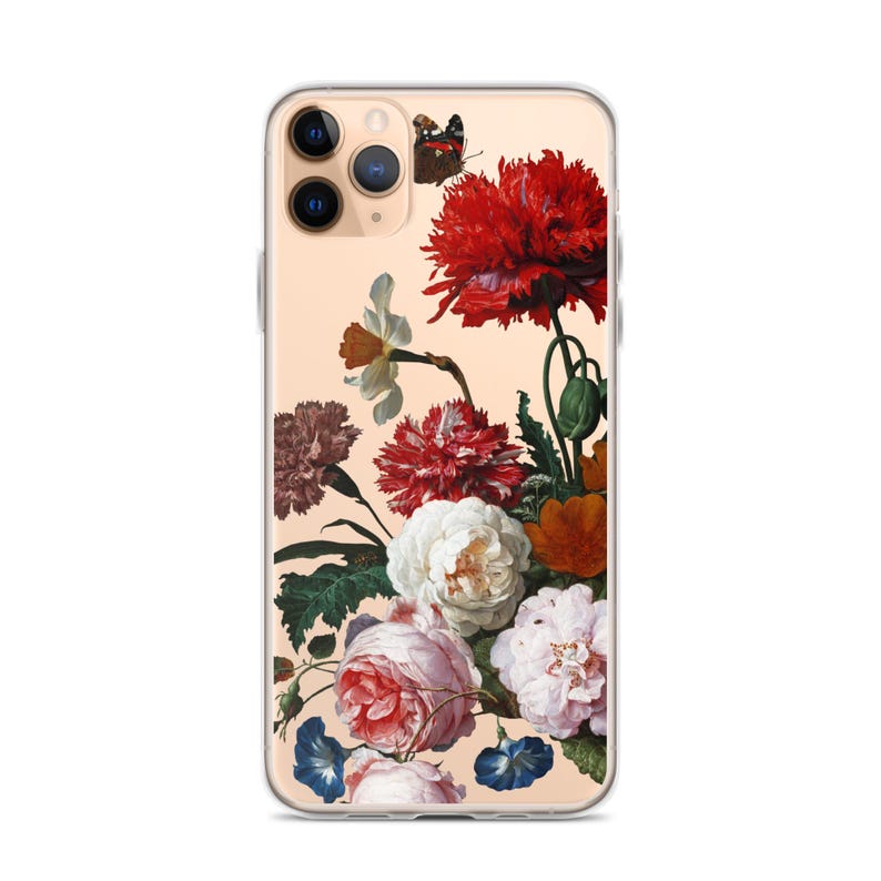 May include: Clear phone case featuring a vibrant floral design with red, white, and pink flowers, green leaves, and a butterfly. The case is designed to fit a smartphone.