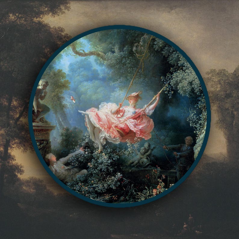 May include: Round wall art featuring a classical painting of a woman on a swing in a lush garden. The artwork is framed with a dark teal border. The woman wears a pink dress and hat, with other figures in the background.