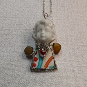 Doll head Necklace , one of a kind,  handcrafted repurposed upcycled broken figurine head and plate shard,wearable art , boho chic necklace