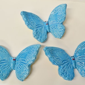 Handcrafted ,Ceramic Decorative Butterfly Tiles for paper weights, bookshelf, home decor , pop of color, bright blue butterflies ,set of 3