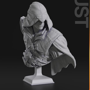 May include: A gray bust sculpture of a person wearing a hooded cloak. The bust is on a white pedestal. The sculpture is titled "Bust" in large, orange letters.