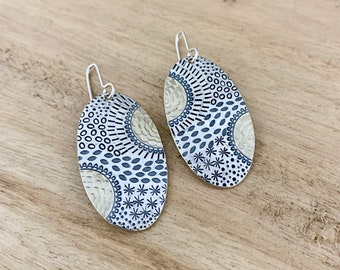 Flow -hand stamped dangle earrings. Sterling wires. Repurposed from silver plate vintage spoons. Unique sustainable jewellery.