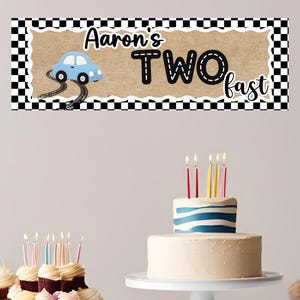 May include: A birthday banner with the text "Aaron's TWO fast" and a blue race car graphic. A two-tiered cake with candles and cupcakes are on display. The image includes the text "EDIT ON CANVA" and "DOWNLOAD TO YOUR PHONE OR COMPUTER PRINT AT WALGREENS OR CVS."