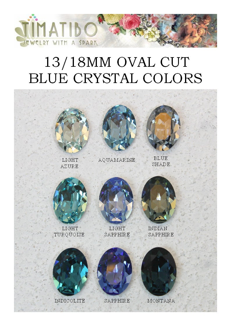 May include: A collection of nine 13/18mm oval cut crystals in various blue shades, labeled as Light Azure, Aquamarine, Blue Shade, Light Turquoise, Light Sapphire, Indian Sapphire, Indicolite, Sapphire, and Montana, arranged in a grid.