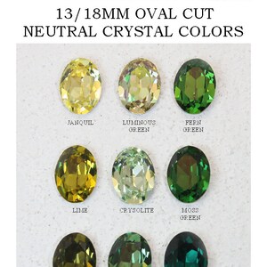 May include: A collection of nine 13/18mm oval cut crystals in various green and yellow shades labeled Janquil, Luminous Green, Fern Green, Lime, Crysolite, Moss Green, Khaki, Erinite, and Emerald, presented under the text 13/18MM OVAL CUT NEUTRAL CRYSTAL COLORS.
