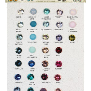 May include: A chart of 36 different colored Swarovski crystal stones. The chart is labeled with the name of each stone, such as "Clear", "Air Blue Opal", "Light Turquoise", "Violet", "Rose Water Opal", "Light Azore", "Caribbean Blue", "Aquamarine", "Lavender", "Rose Alabaster", "Indian Sapphire", "Turquoise", "Vitrail Lite", "Tanzanite", "Khaki", "Denim Blue", "Mint Alabaster", "Vintage Rose", "Ruby", "Montana", "Capri Blue", "Antique Pink", "Fuchsia", "Sapphire", "Blue Zircon", "Amethyst", "Rose", "Light Sapphire", "Indicolite", "Cyclamen Opal", and "Light Rose".