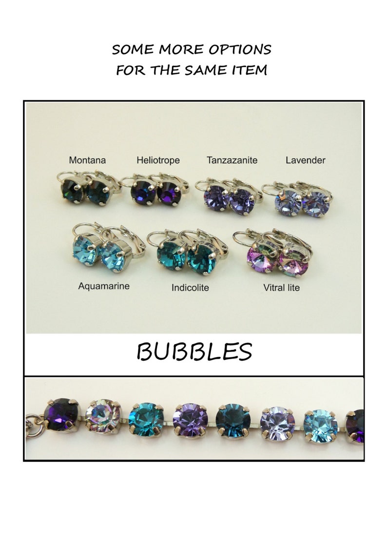 May include: A set of earrings with different colored crystals. The colors include Montana, Heliotrope, Tanzanite, Lavender, Aquamarine, Indicolite, and Vitral lite. The earrings are silver and have a simple design. The text "BUBBLES" is written below the earrings.