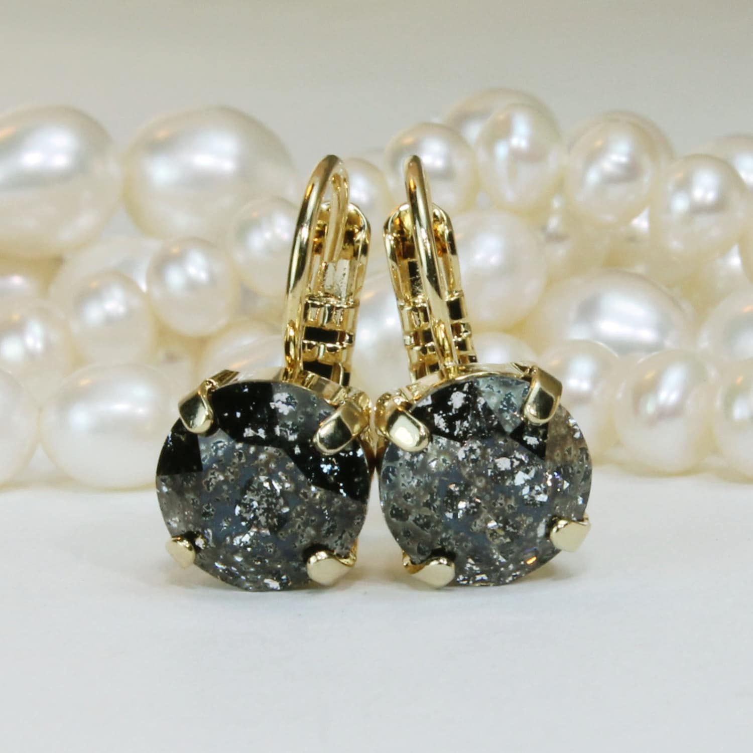 single black stone earrings in gold