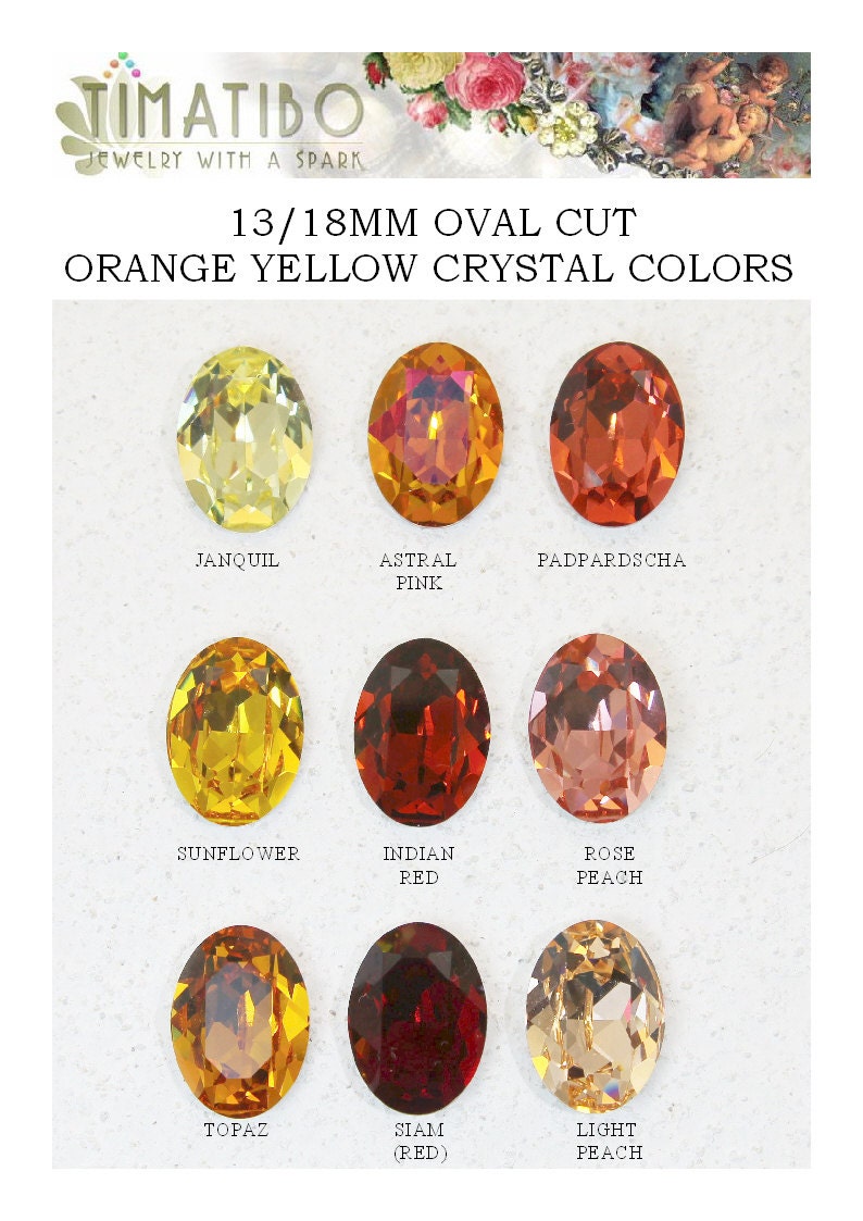 May include: A collection of nine 13/18mm oval cut crystals in orange and yellow shades. The crystals are labeled Janquil, Astral Pink, Padpardscha, Sunflower, Indian Red, Rose Peach, Topaz, Siam (Red), and Light Peach, arranged in a grid.