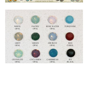 May include: A chart showing 12 different colors of opal stones. The colors include white, pacific, rose water, turquoise, grey, green, air blue, red coral, chrysolite, cyclamen, caribbean, and jet black.