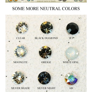 May include: Nine different colors of crystal rhinestones, including clear, black diamond, jet, moonlite, greige, white opal, silver shade, silver night, and AB.