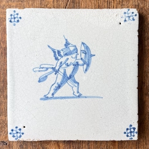 Rare 17th Century Dutch Delft Tile – Armed Cupid (Amor) with Shield and Arrows – Blue & White Delftware