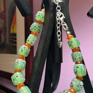 Handmade Glass and Sterling Silver Bracelet Green and Orange Glass
