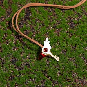 Unique bird head key necklace for anime collectors, featuring a lightweight 60g design and durable alloy craftsmanship, ideal for adding a magical girl touch to any cosplay or casual outfit.